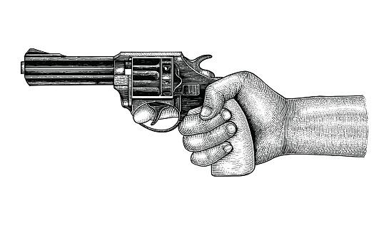 Hand holding gun,Retro drawing engraving illustration